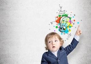 Baby boy pointing at light bulb Baby boy pointing at light bulb